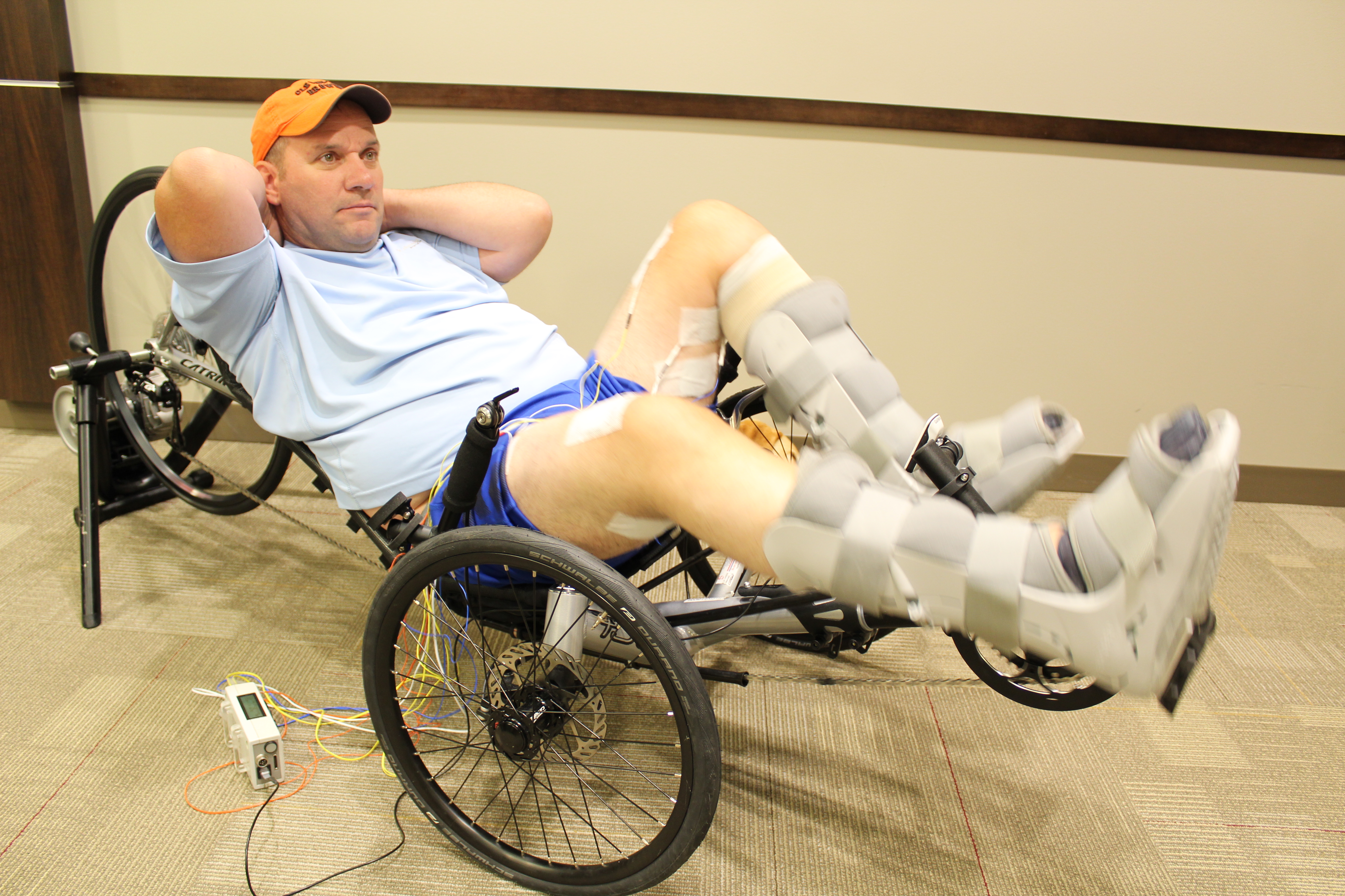 Man riding a stationary bike indoors